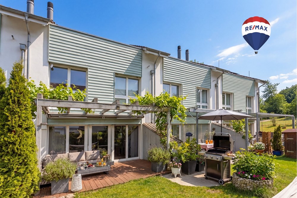 Einfamilienhaus - Kauf - Seuzach, Zürich - Titelbild mit Ballon.jpg - 110161065-68