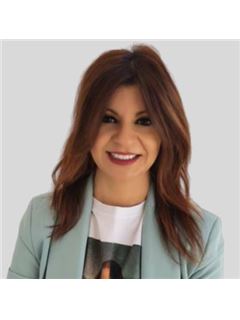 Cristina Alvarez - RE/MAX FIDELITY