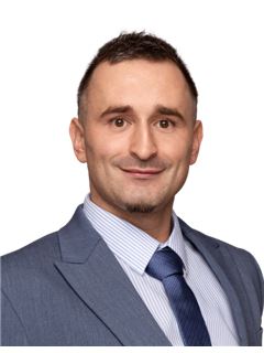 Radek Kozel - RE/MAX Magnum