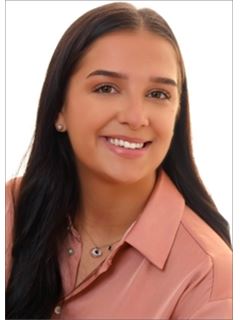 Romina Polli - RE/MAX Plus 1