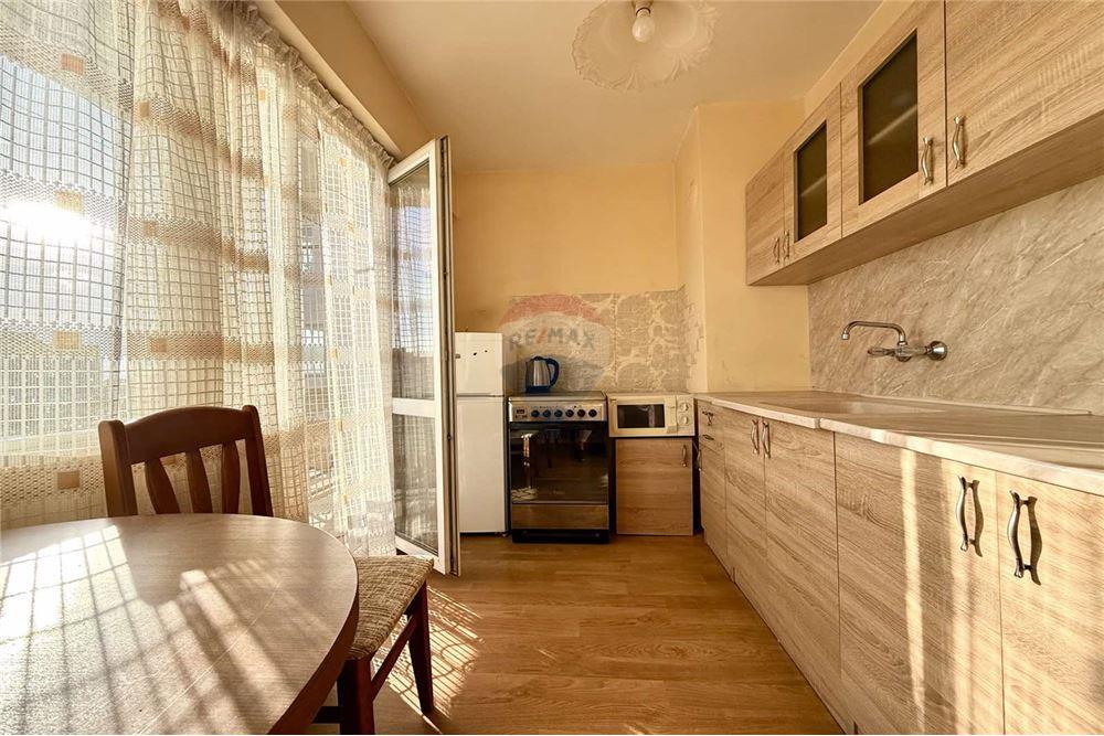 Апартамент - За продажба - гр. Варна, Област Варна, България - Слънчева кухня с изход към открита тераса с частична панорамна гледка - Кухня - 360321025-285