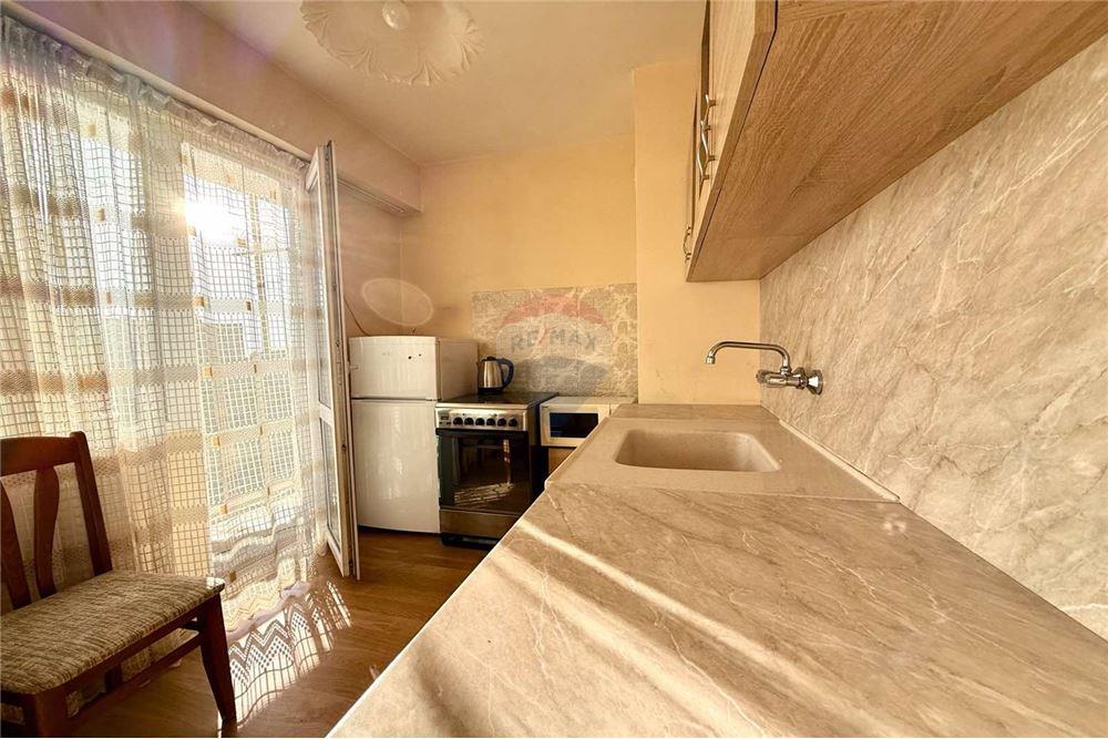 Апартамент - За продажба - гр. Варна, Област Варна, България - Слънчева кухня с изход към открита тераса с частична панорамна гледка - Кухня - 360321025-285