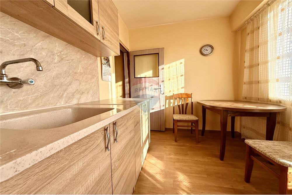 Апартамент - За продажба - гр. Варна, Област Варна, България - Слънчева кухня с изход към открита тераса с частична панорамна гледка - Кухня - 360321025-285