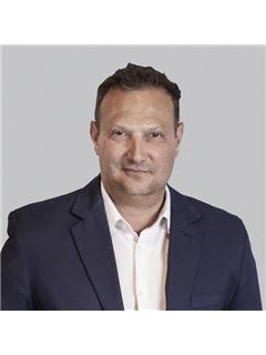 Hernán Valsecchi - RE/MAX Titanium
