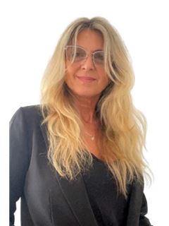 Paola Reggio - RE/MAX Uno