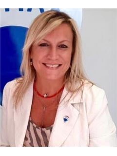 Mariela Pochettino - RE/MAX Cordial