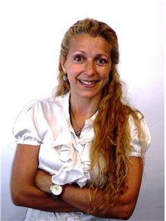 Elizabeth Sintes - RE/MAX Urbana