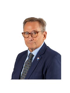Hugo Trozzoli - RE/MAX Net