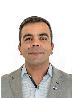Timoteo Paunero - RE/MAX Roble