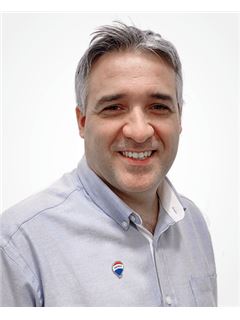 Adrian Scarione - RE/MAX Life