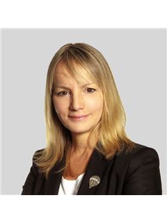 Florencia Loaiza - RE/MAX Blue