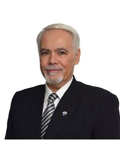 Carlos Agüeros - RE/MAX Express