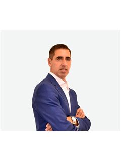 Carlos Pangerc - RE/MAX Premium IV