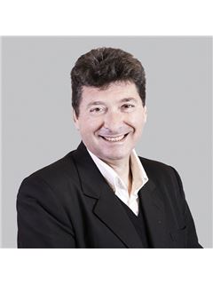Omar Perruccio - RE/MAX Titanium