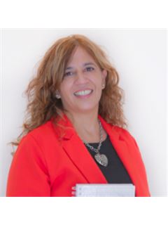 Monica Abraham - RE/MAX Puerto