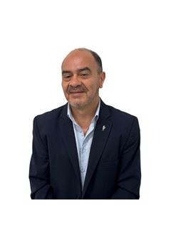 Miguel  Caminos - RE/MAX Premium