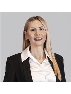 Roxana Cottone - RE/MAX Titanium