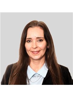 Daniela Saieg - RE/MAX Blue