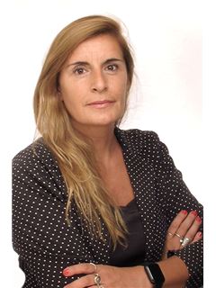 María Fernanda Mansilla - RE/MAX Solutions
