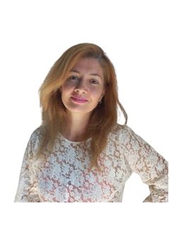 Andrea  Tonianez - RE/MAX Urbana
