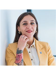Andrea Cruz - RE/MAX Vincit