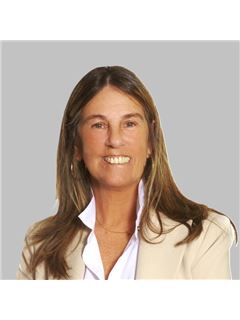 Marcela Alarcón - RE/MAX Blue