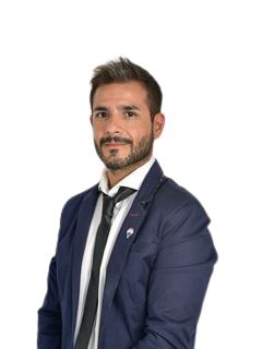Israel Miguel Garro - RE/MAX Docta
