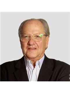 Carlos Canievsky - RE/MAX Blue