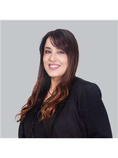Mónica Guzzo - RE/MAX Titanium