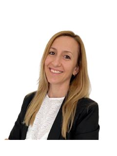 María Pía Parola - RE/MAX Premium II