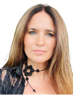 Laura Marzullo - RE/MAX Raíces