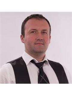 Associate - Marius Muresan - RE/MAX Central