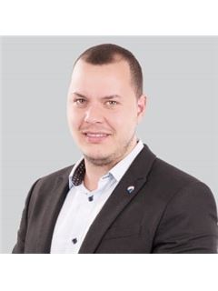 Associate - Marius Gainariu - RE/MAX Central