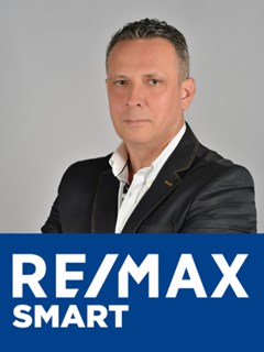 Tomasz Pieńkosz - RE/MAX Smart