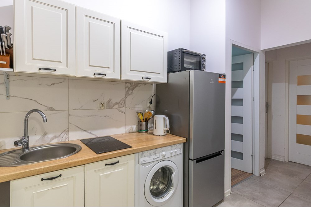 Mieszkanie na parterze - Sprzedaż - Łódź, Polska - Mieszkanie-na-sprzedaz-Lodz-Widzew-8.jpg - 470191045-180