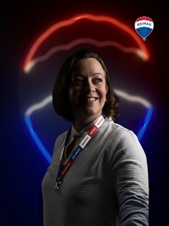 Juliane Moro - RE/MAX GRUPO COSTA LESTE