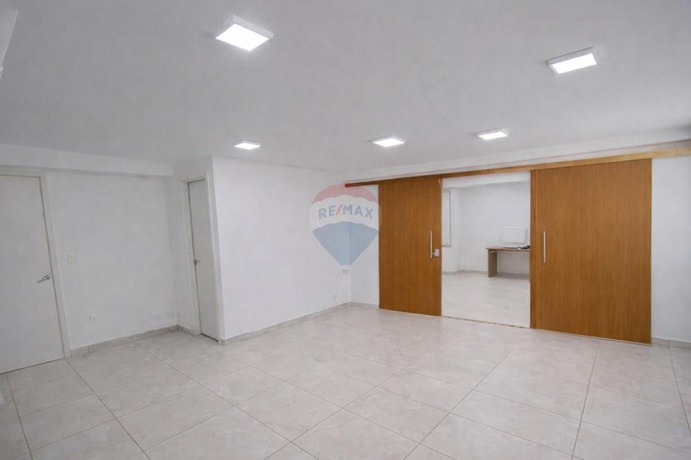 Ponto Comercial - Alugar - Rio de Janeiro , Rio de Janeiro - Sala minimalista com portas de madeira.jpeg - 570371001-210