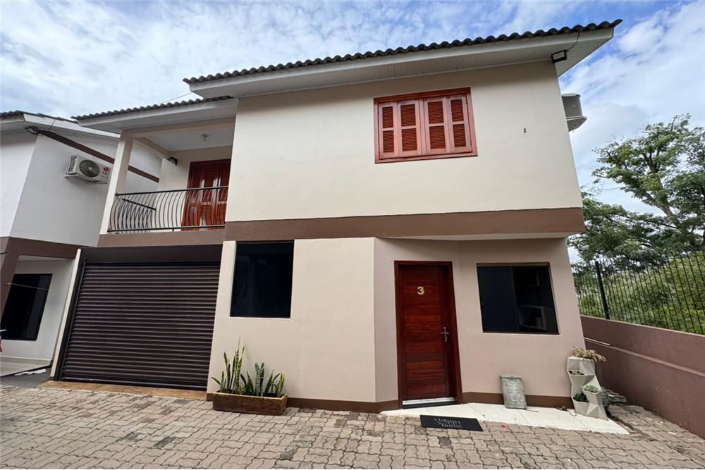 Casa à venda com 3 quartos, 119m² - Foto 1