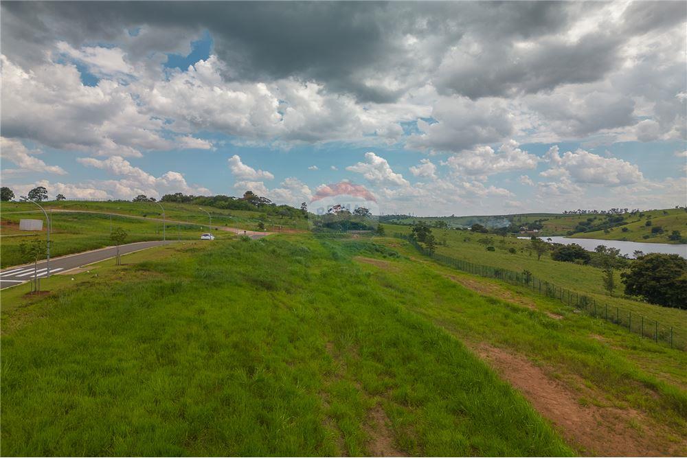 Terreno - Venda - Campinas , São Paulo - Visão lateral pela via de acesso principal  - 690681118-133