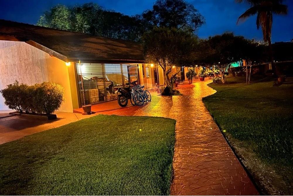 Casa de Condomínio - Venda - Ribeirão Preto , São Paulo - varanda a noite.jpeg - 780171066-24