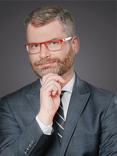 Krzysztof Jaguś - RE/MAX Invest