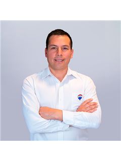 Carol Urgiles - RE/MAX Prime