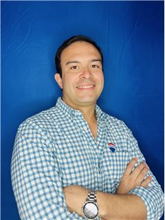 Associate - Juan Carlos Aponte - RE/MAX ZONE