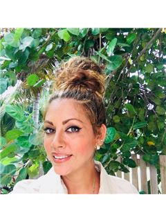 Lisa Quiroz - RE/MAX ISLAND REAL ESTATE