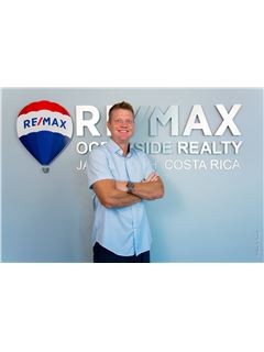 Travis Comstock - RE/MAX OCEANSIDE REALTY
