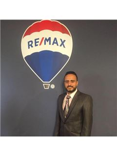 Mounier Mansour - RE/MAX THE ADDRESS 