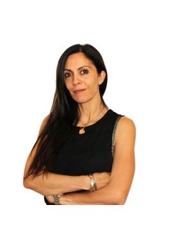 Karina Bonilla - RE/MAX Único