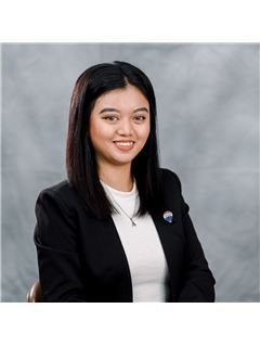 Angela Baquiran - RE/MAX 8 Realty